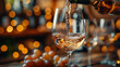 © Q77photo - A glass of white wine is poured into a wine glass