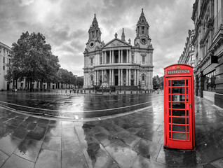 Sticker - Saint Paul's cathedral and red telephone box on rainy day in London. England