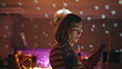 © stockbusters - Sad woman waiting call looking on cellphone screen under disco ball close up.