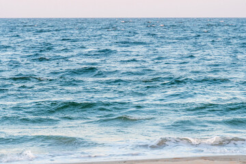 Wall Mural - Avon By the Sea, New Jersey, USA - Golden hour sunrise on the beach