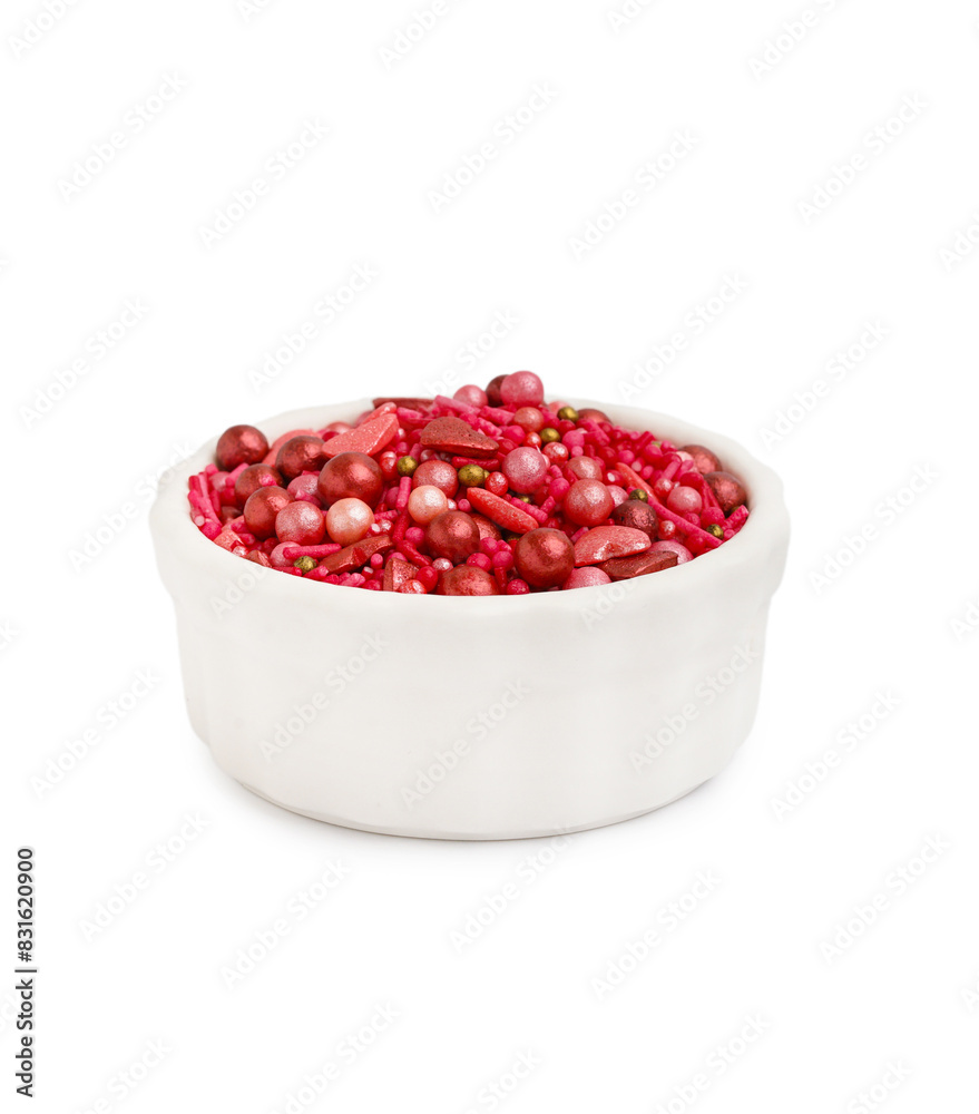 Bowl with sweet pink sprinkles on white background