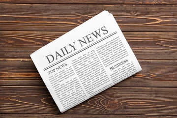 Sticker - Daily newspaper on wooden background