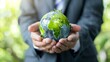 © AI Images - Businessmen holding world to Organization Sustainable development environmental Sustainable business or green company Concept business responsible environmental social and governance : Generative AI