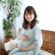 © Logmotion - 笑顔の可愛いアジア人の妊婦さん