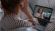 © stockbusters - Friendly sisters talking online at home closeup. Positive girls waving in chat