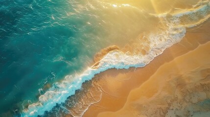 Spectacular top view from drone photo of beautiful beach with relaxing sunlight, sea water waves pounding the sand at the shore. Calmness and refreshing beach scenery