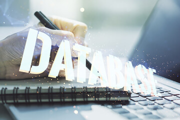 Aufkleber - Double exposure of Database word sign with hand writing in diary on background with laptop, global research and analytics concept