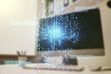 Creative code skull hologram and modern desktop with pc on background, cybercrime and hacking concept. Multiexposure