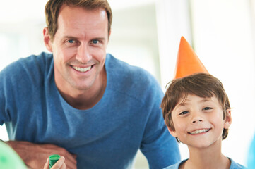 Poster - Birthday, dad and child portrait in home with smile, celebration and party hat with happy family. Event, support and proud parent in a house with surprise and celebrating together with bonding