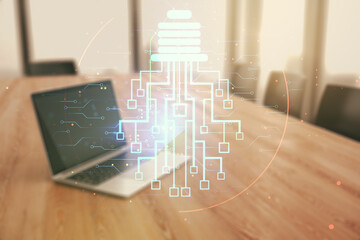 Poster - Double exposure of creative light bulb hologram with chip on laptop background, idea and brainstorming concept