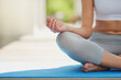 © Adene Sanchez/peopleimages.com - Lotus hands, meditation and woman on a patio for peace, wellness and mental health balance outdoor. Relax, zen and girl on yoga mat for mindfulness, gratitude and holistic, breathing or stress relief