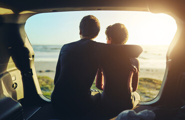 Wall Mural - Boys, sunset and relax in car at beach with hug, bonding and love in summer for travel road trip with ocean. Family, back view and sunshine in transport, tropical vacation and sunrise adventure