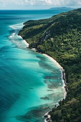 Wall Mural - A winding coastline from above, showcasing the contrast between lush green jungle, pristine beaches