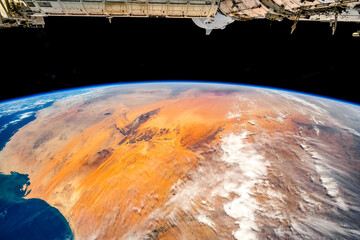 Wall Mural - desert land and planet earth's horizon. digital enhancement of an image by nasa