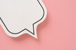 © Ratana21 - For conceptual image about communication and social media, customer feedback, part of real blank white speech bubble paper cut on pink color background