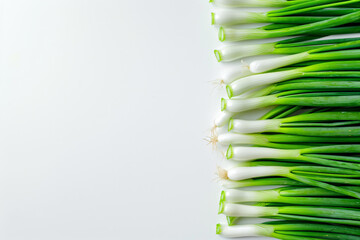 Wall Mural - a bunch of green onions on a white surface