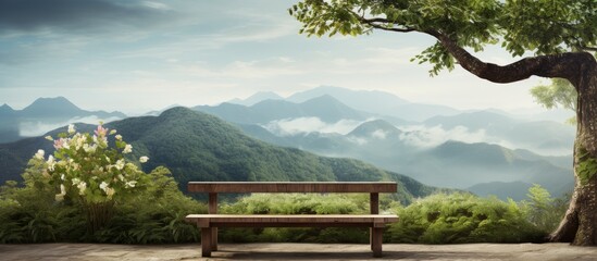 Wall Mural - a bench with a table under a tree against the background of mountains. creative banner. copyspace im