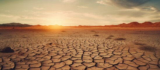 Poster - World problem with global warming dry cracked earth The desert It s hot the global shortage of water on the planet. Creative banner. Copyspace image