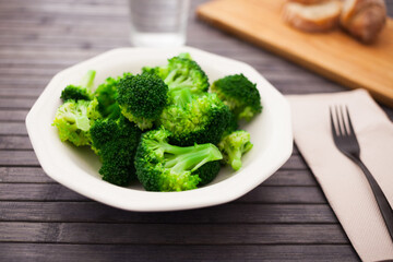 Wall Mural - Diet food. steamed broccoli on plate