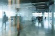 © Niks Ads - blurry motion people walking in an office area