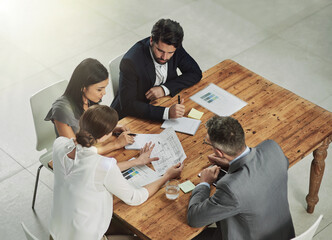 Poster - Architect, meeting and business people with blueprint in office for review, discussion or renovation project. Lens flare, architecture firm and employees for conversation, floor plan or teamwork