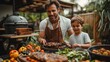 © acnaleksy - Father with little son grilling outside during family summer garden party