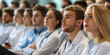 © nopommajun - A focused group of medical students attentively participate in a lecture, showcasing dedication to learning