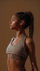 Wall Mural - Gym girl isolated on a chestnut brown background