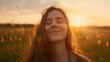 ©  Abyss Photo - Backlit Portrait of calm happy smiling free longhair woman with closed eyes enjoys a beautiful moment life on the fields at sunset.