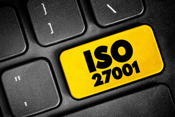 ISO 27001 - international standard on how to manage information security, concept button on keyboard