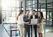 © Ruan Jordaan/peopleimages.com - Business, people and tablet in office with collaboration, meeting and planning for company project. Financial analyst, corporate and technology with teamwork, strategy and agenda for investment deal
