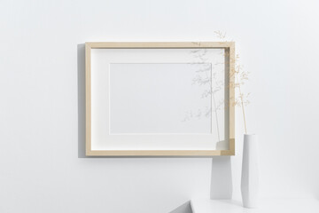 Wall Mural - Wooden landscape frame mockup on white wall with copy space for artwork design