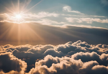 Beautiful sunset landscape in sky. Rays of sun illuminate clouds and create a beautiful background