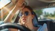 © Sun - Woman tried face and suffering heat stroke in the car from summer and climate problem.