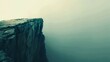 © stockpro - Dramatic cliff edge amid foggy atmosphere depicting solitude and introspection, perfect for serene and contemplative themes.