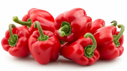 Cluster of fresh red bell peppers on a white background showcasing their vibrant color and smooth texture
