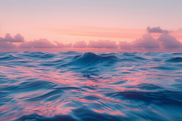 Poster - A serene ocean at sunset with rhythmic waves and a sky filled with shades of pink and orange,