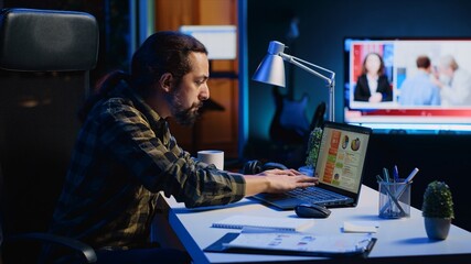 Poster - Man concerned about statistical data financial graphs on laptop screen while researching data for company project. Freelancer unhappy about business graphic figures, feeling stressed, camera A