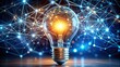 © wasana - Illuminated light bulb with digital connection, showcasing modern technology and innovation
