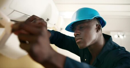 Poster - Air conditioning, repair and black man with maintenance and electrician with aircon cleaning and job. Working, technician and construction worker with thermostat check and contractor in a home
