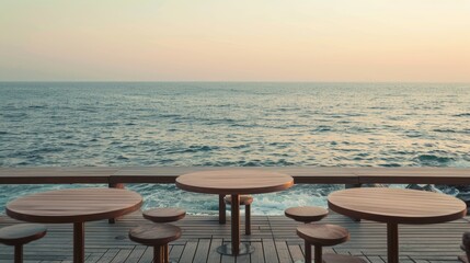 Wall Mural - Four wooden tables by the ocean