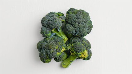 Wall Mural - Broccoli photographed from above on a plain white backdrop