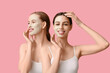 © Pixel-Shot - Beautiful young happy women with facial masks on pink background