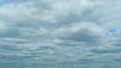 Dramatic gloomy clouds in sky. Amazing gloomy rain clouds. Time lapse.