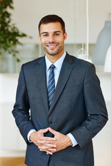 Canvas Print - Corporate, portrait and proud with business man at office for start of professional career as intern. Company, confident and suit with smile of formal employee in workplace for administration