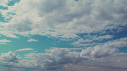 Blue Heaven Summer Cloudscape. Rolling Puffy White Layered Clouds Are Moving. Tropical Summer Sunlight. Tropical Sky At Day Time.