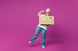© ViDi Studio - Full body young happy lesbian woman wear pink animal clothes hold cardboard card with be yourself title text show v-sign isolated on plain purple background. Pride day June month love LGBTQ concept.