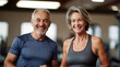 © triocean - Older couple portrait before together training in gym