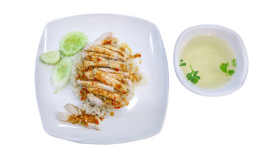 Wall Mural - Top view of A steamed rice topped with chicken on a white plate, focus selective