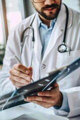 Poster - A scientist or medical professional holds a pen and writes notes on a clipboard, likely working on a project or recording data